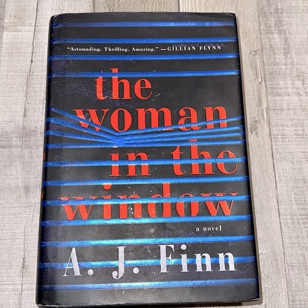 The woman in the window hardback book by AJ Finn